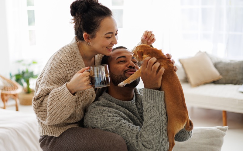 people in home with pet