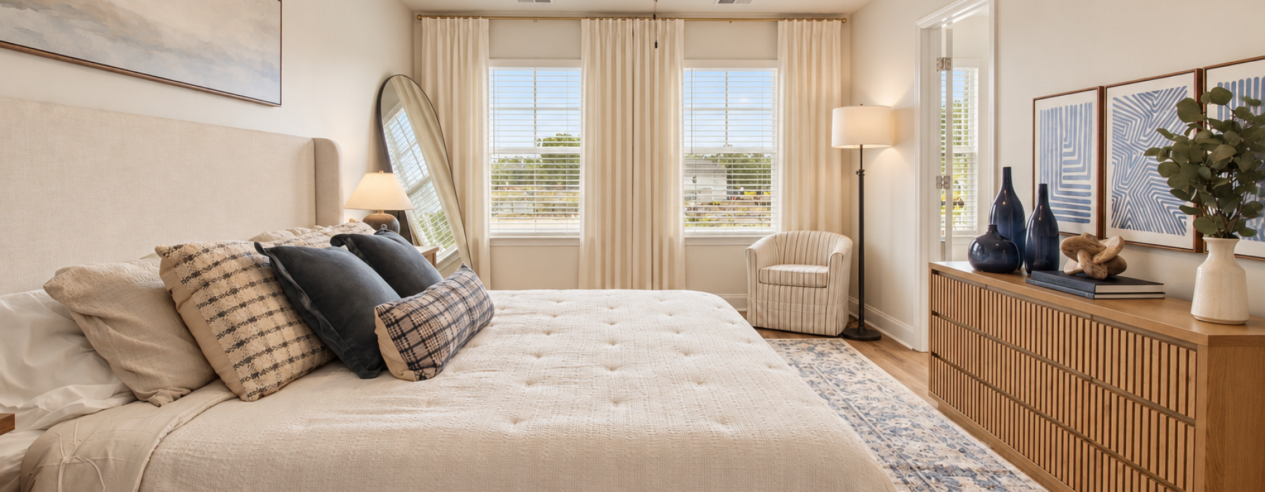 spacious bedroom area with ample natural light