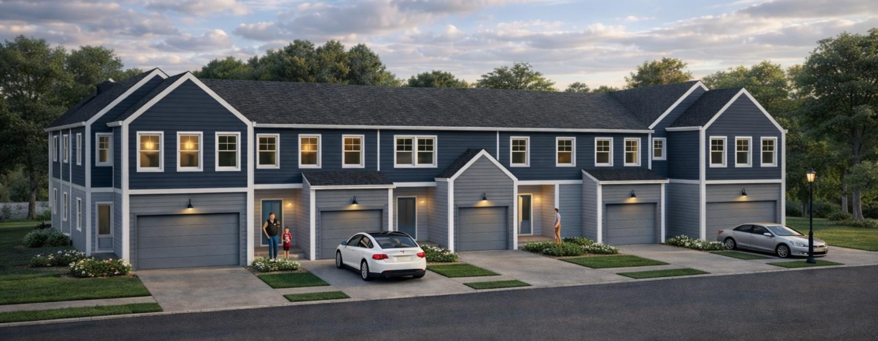 a row of  townhomes with cars parked in front