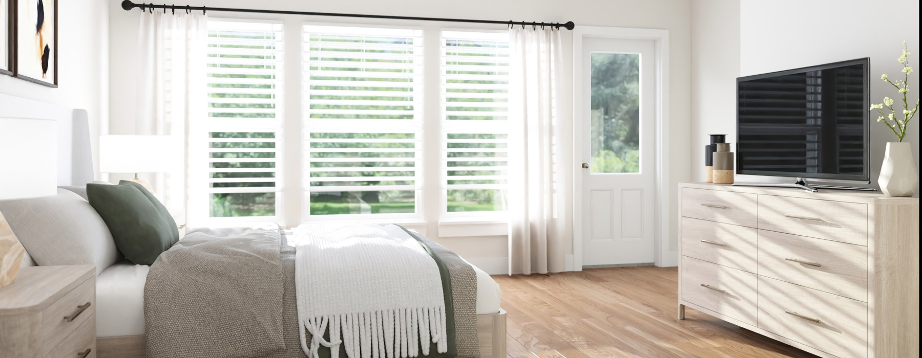 spacious bedroom area with ample natural light